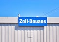 Sign with the German word Zoll means customs duty and the French word Douane means customs Royalty Free Stock Photo