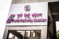 A sign giving directions to the platform of the train station, Pune, India