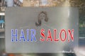 Sign of a hair salon located at Barbican estate complex in London Royalty Free Stock Photo