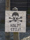 Sign halt stoj in the former concentration camp. Auschwitz Birkenau