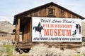 Sign for Hollywood Film History Museum painted on Western cabin Sierra Nevada Alabama Hills