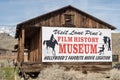 Sign for Hollywood Film History Museum painted on Western cabin Sierra Nevada Alabama Hills