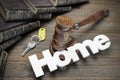 Sign Home, Key, Judges Gavel And Book On Wood Table Royalty Free Stock Photo