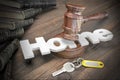 Sign Home, Key, Judges Gavel And Book On Wood Table Royalty Free Stock Photo