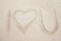 Sign of I Love Sea on the sand beach. Royalty Free Stock Photo