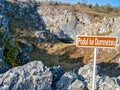 A sign indicating God`s Bridge Podul lui Dumnezeu, a natural bridge created by the colapse of a cave