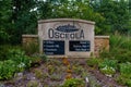 Sign indicating locations in the village of Osceola, Wisconsin.