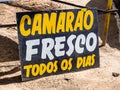 Sign indicating shrimp and seafood portugues