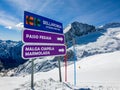 Sign indicating slopes and towns Passo Fedaia, Malga Ciapela, Marmolada and the access to the Sellaronda circuit, Dolomites, Royalty Free Stock Photo