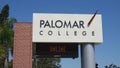 A sign informing that classes at Palomar College are online on