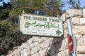 The sign with the inscription - The Garden Tomb - at the entrance to The Garden Tomb Jerusalem located in East Jerusalem, Israel Royalty Free Stock Photo