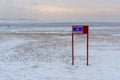 Sign with inscription in Russian Swimming is prohibited in winter Royalty Free Stock Photo