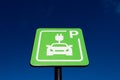 Sign of an Izivia charging station indicating a parking space reserved for charging electric vehicles