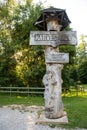 Sign of Karves ola Cow`s Cave, karst sinkhole in Birzai, Lithuania