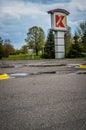 Sign for a Kmart store, as seen from a parking lot