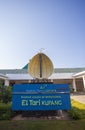 Sign of Kupang Airport, El Tari, with Sasando, a traditional music instrument as icon.