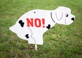 Sign on the lawn prohibiting dog walking Royalty Free Stock Photo