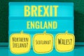 Sign with light inscription in German Brexit, England, Northern Ireland, Wales and Scotland in English Northern Ireland, Scotland,