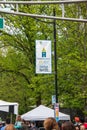 Sign on light pole advertising the Communiversity Artsfest celebrated in Princeton, NJ