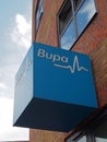 Sign and logo above a bupa healthcare building in leeds city centre