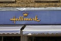 Sign and logo above a hallmark card and gift store in brighouse town centre