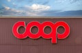 Sign with logo Coop, it is a italian cooperative