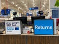 The sign at Lowes home improvement store that reads Returns