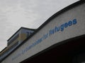 Sign at the main entrance of the UNHCR headquarters in Geneva