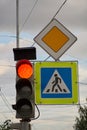 Sign main road. pedestrian crossing sign. red traffic signal Royalty Free Stock Photo