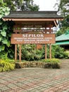 Sign marks entrance to Sepilok Orang Utan Rehabilitation Centre in Sandakan,Sabah,Malaysia. Royalty Free Stock Photo