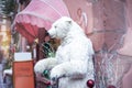 Sign Merry Christmas and bear as decorations near building in center of small alsacian village near Colmar, Alsace, France during Royalty Free Stock Photo