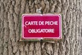 French Mandatory fishing card sign Royalty Free Stock Photo