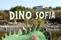 A sign with name of the Dino Sofia parkland. The new one largest park of dinosaurs in Ukraine