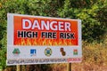 A sign warns residents of the high wildfire danger