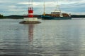 Sign on the natural pond, the river,the sea of danger and the cargo ship