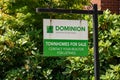 A sign of new townhouse development `Dominion Georgian Rowhomes` which was build near the Robert Pickton`s property Royalty Free Stock Photo