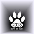 Sign of the new year in the form of a trace of a dog`s paw. Vector. Royalty Free Stock Photo