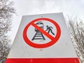 Sign not to walk on railway tracks. Railway Crossing Not Allowed or Walking on Railroad Prohibited. Russia Royalty Free Stock Photo