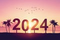 2024 sign number with palm tree and birds flying at tropical sunset beach abstract background. Happy new year and holiday