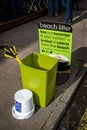 Sign offering reward for people collecting beach rubbish in Aldeburgh, Suffolk, UK