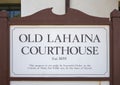 Sign for the Old Lahaina Courthouse in Lahaina Banyan Court Park on the island of Maui in the state of Hawaii.