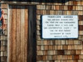 Sign outside hunting cabin, Herschel Island, Canada Royalty Free Stock Photo