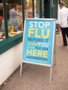 Sign outside pharmacy stop flu before it stops you