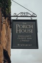Sign outside The Porch House pub and inn in Stow-on-the-Wold, UK