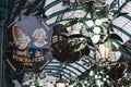 Sign outside Punch & Judy pub in Covent Garden Market, London, UK, Christmas decorations on background