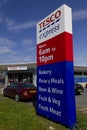 A sign outside a Tesco Express, Moreton, Wirral, England Royalty Free Stock Photo