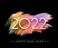 2022 sign over colorful gradient brush strokes