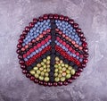 Sign pacifism of fruits and berries. Geometric pattern of summer fruits and berries: gooseberries, raspberry, red and black