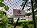 A sign in a park - Do Not Litter