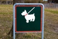 A sign in the park that means walking the dog only on a leash Royalty Free Stock Photo